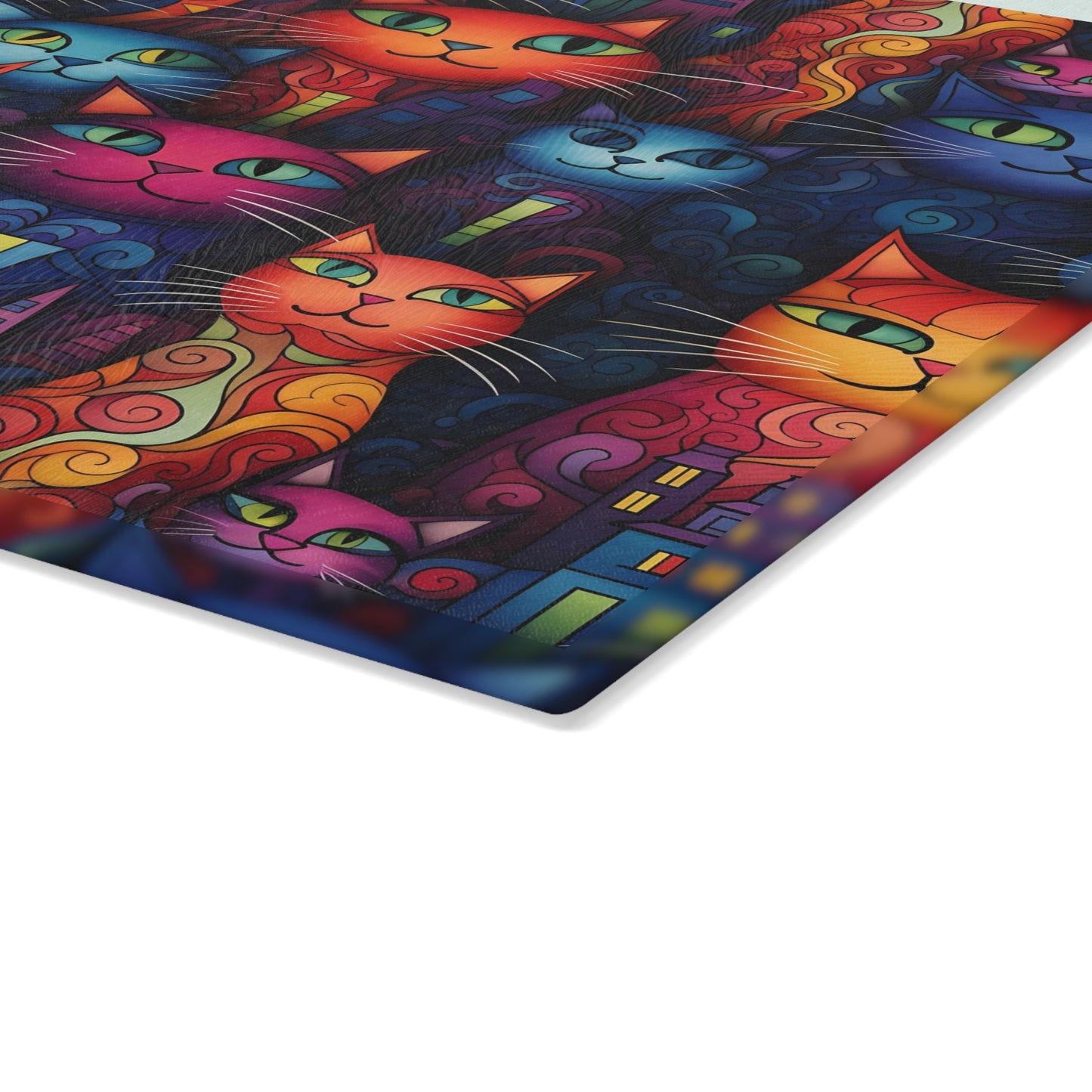 Close-up of decorative glass cutting board featuring cute colorful cats in a creative cityscape. Small size is .24 inches thick.