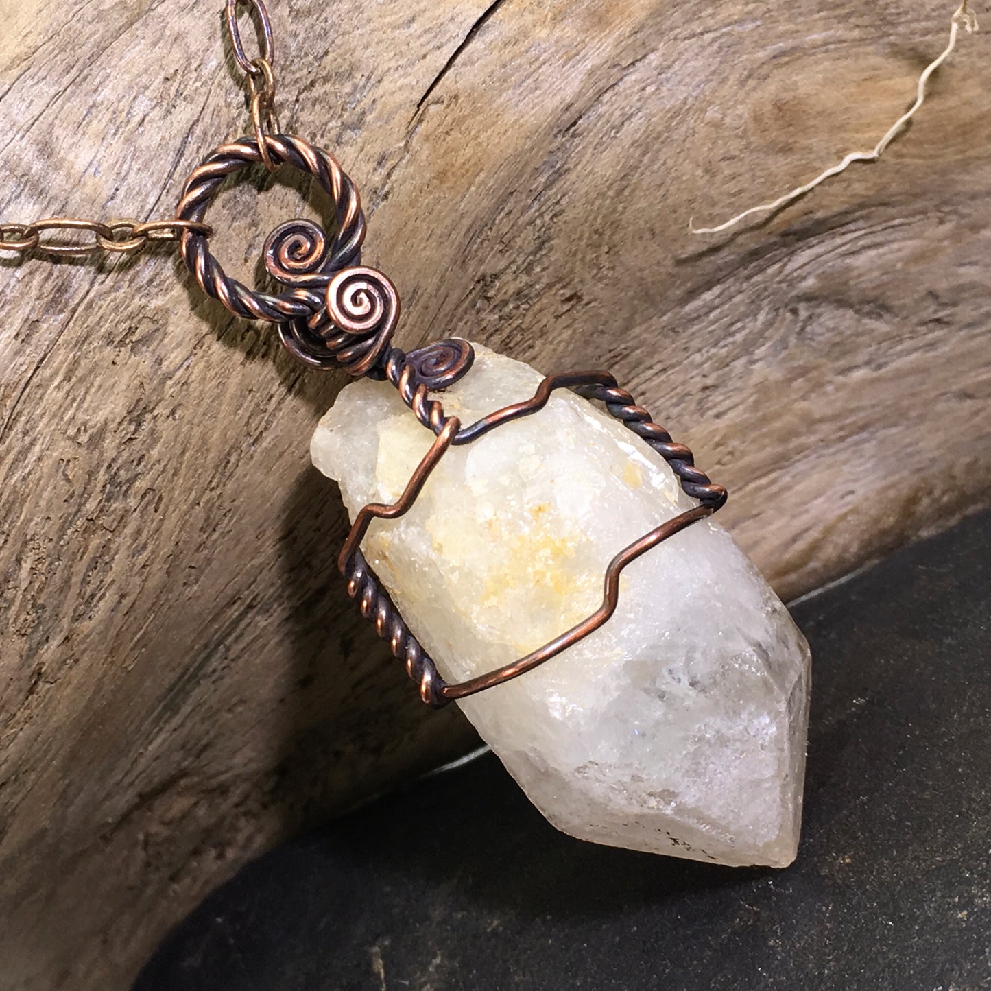 Citrine crystal pendant with copper piece of driftwood.