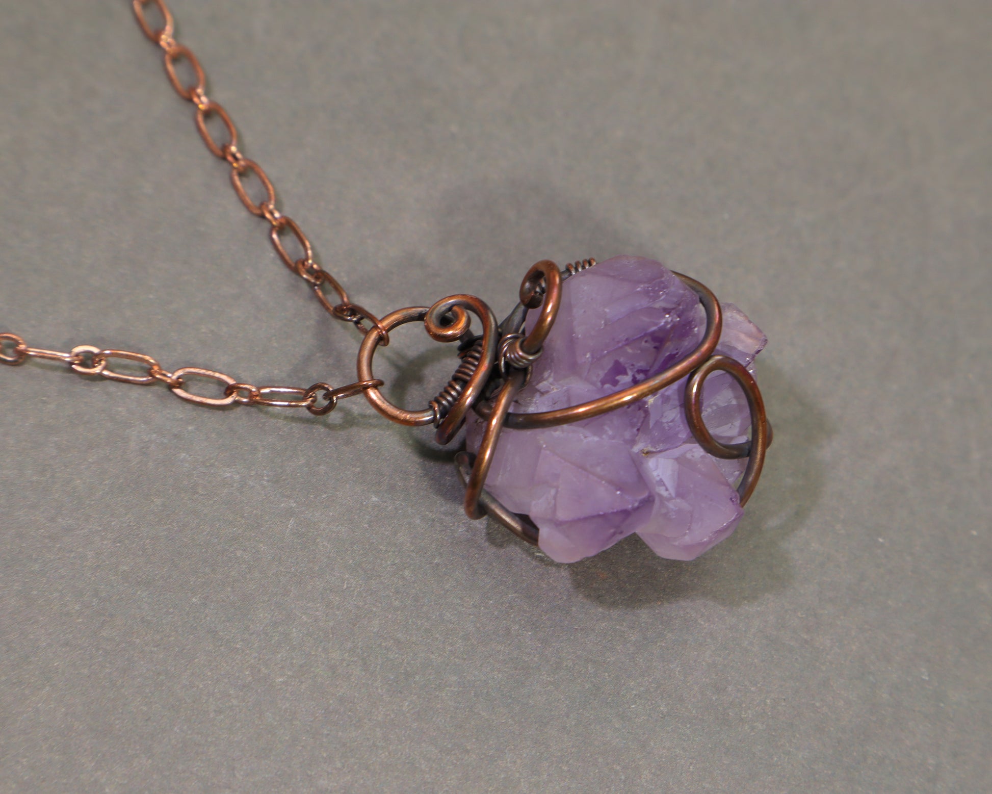 Elestial amethyst crystal pendant wire wrapped in oxidized copper
