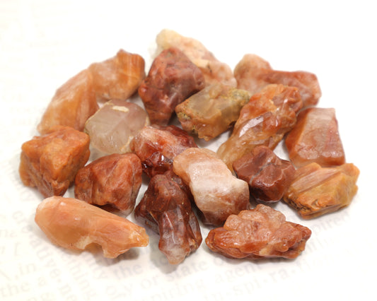 Opaque red quartz crystal rough with iron inclusions