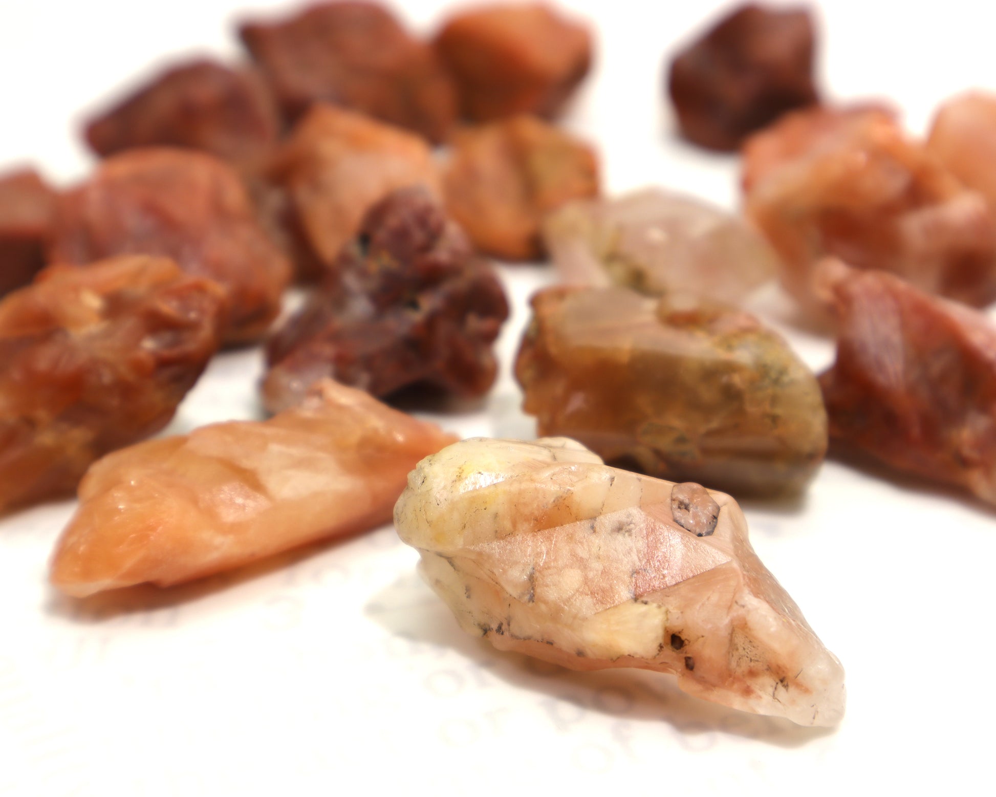 Semi-transparent hematoid quartz rough with pale mauve tone