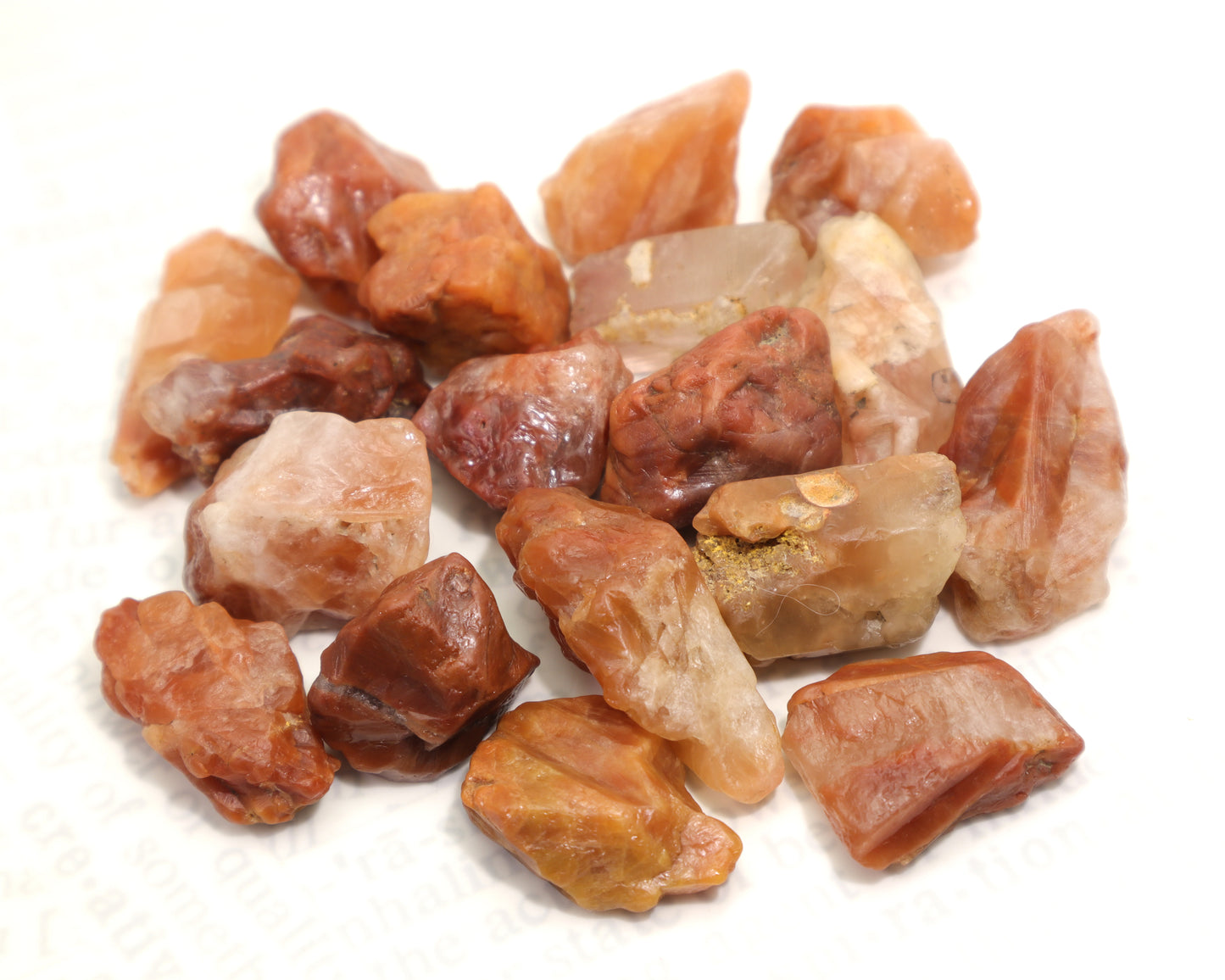 Natural hematoid quartz rough stones in red and orange tones