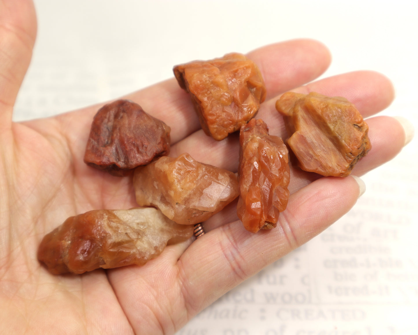 Rough quartz crystal with altered growth faces and hematite color