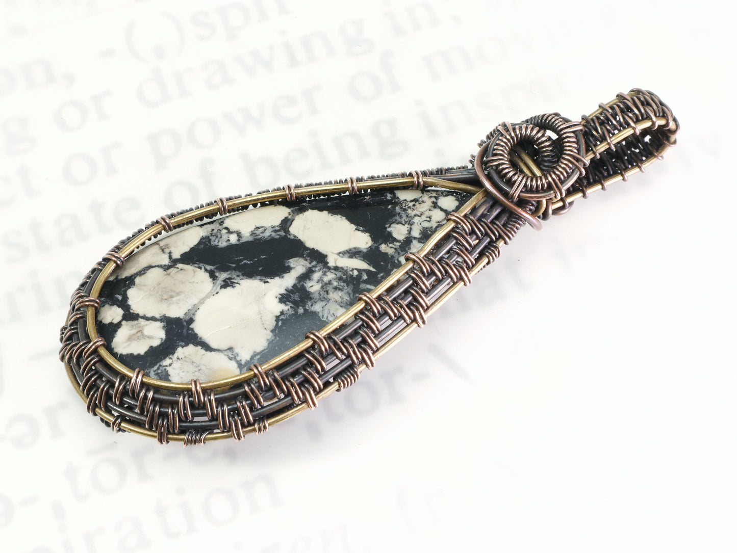 Wire woven fossil-like magnesite cabochon pendant