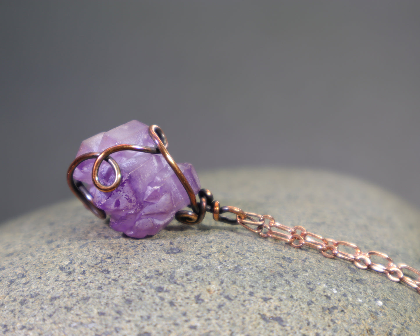 Raw amethyst crystal pendant necklace wire wrapped in oxidized copper