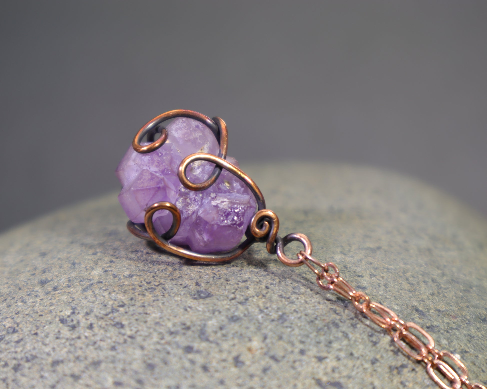Natural amethyst crystal cluster pendant handcrafted from copper wire