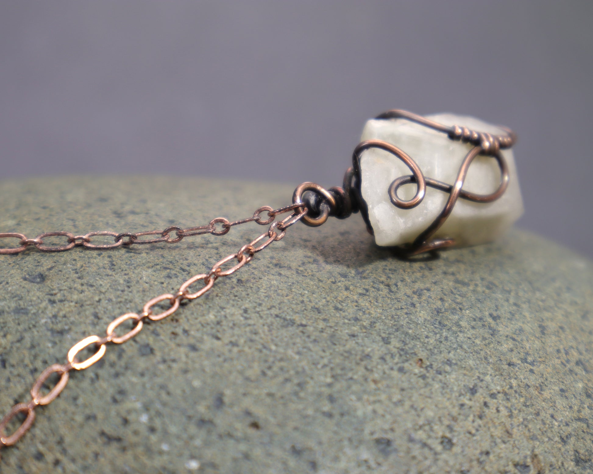 Top view of genuine unheated phantom citrine crystal necklace handcrafted in copper wire
