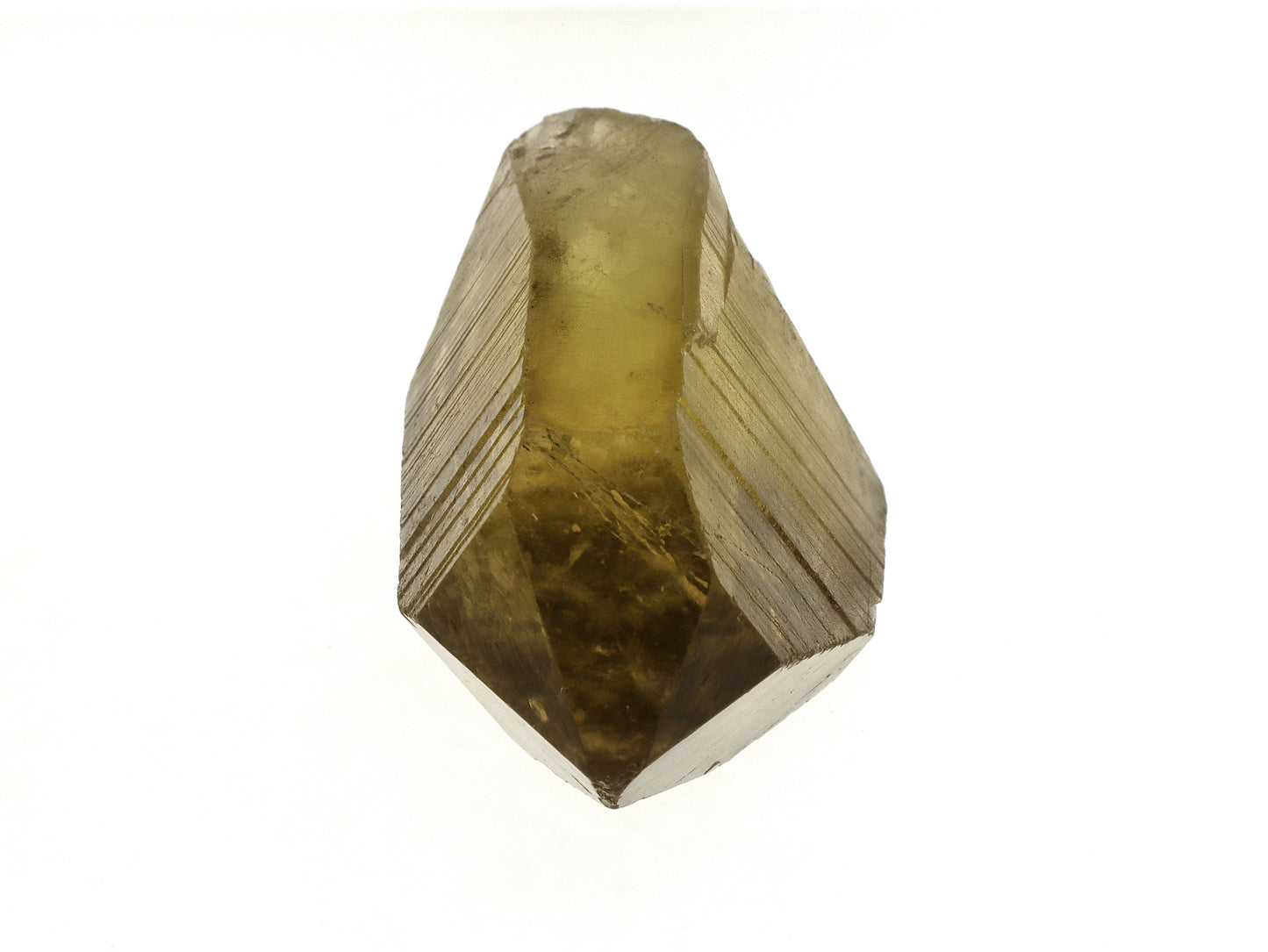 Close up of the termination of a smoky lemon citrine specimen showing hexagonal crystal habit