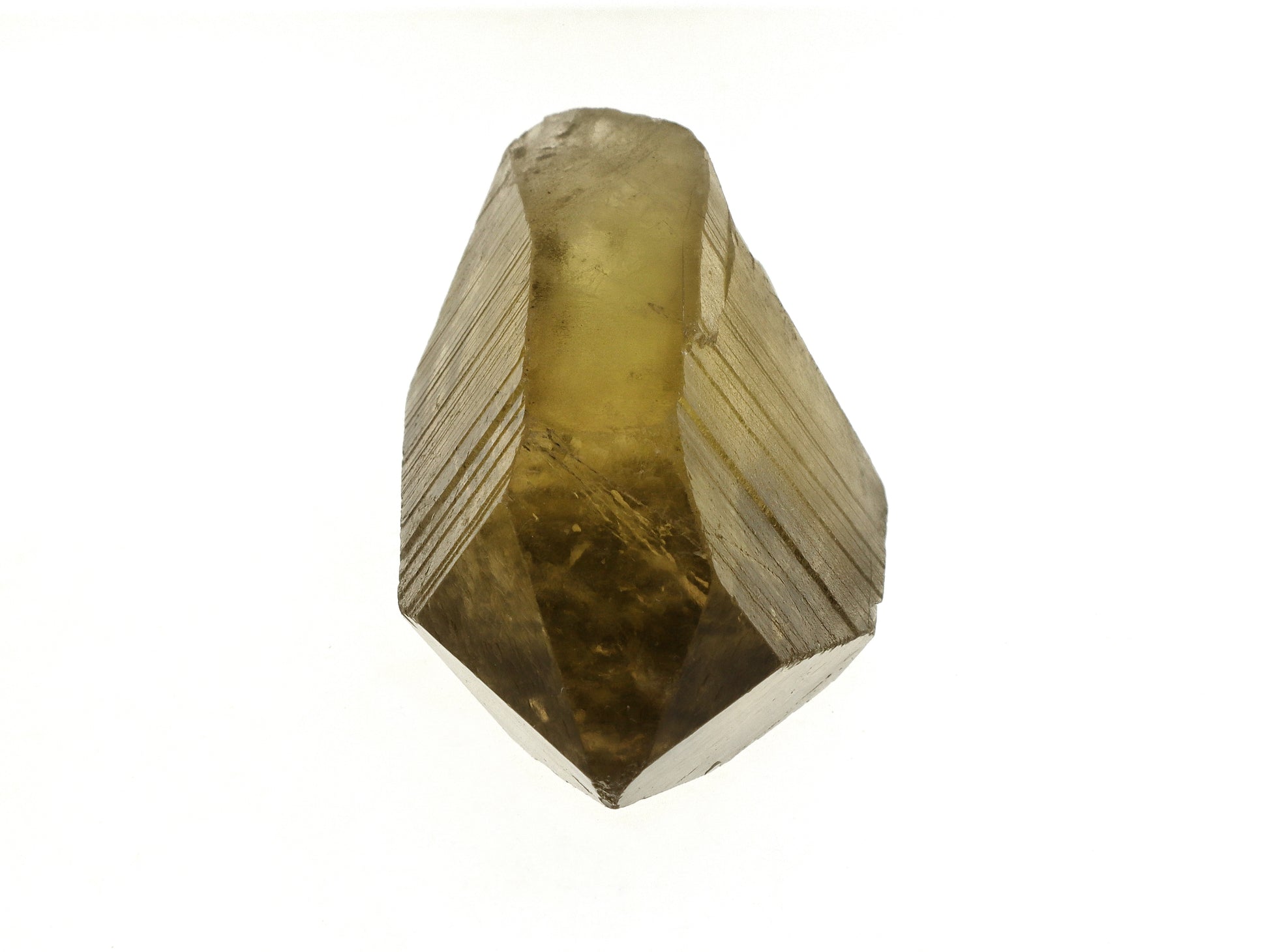 Close up of the termination of a smoky lemon citrine specimen showing hexagonal crystal habit