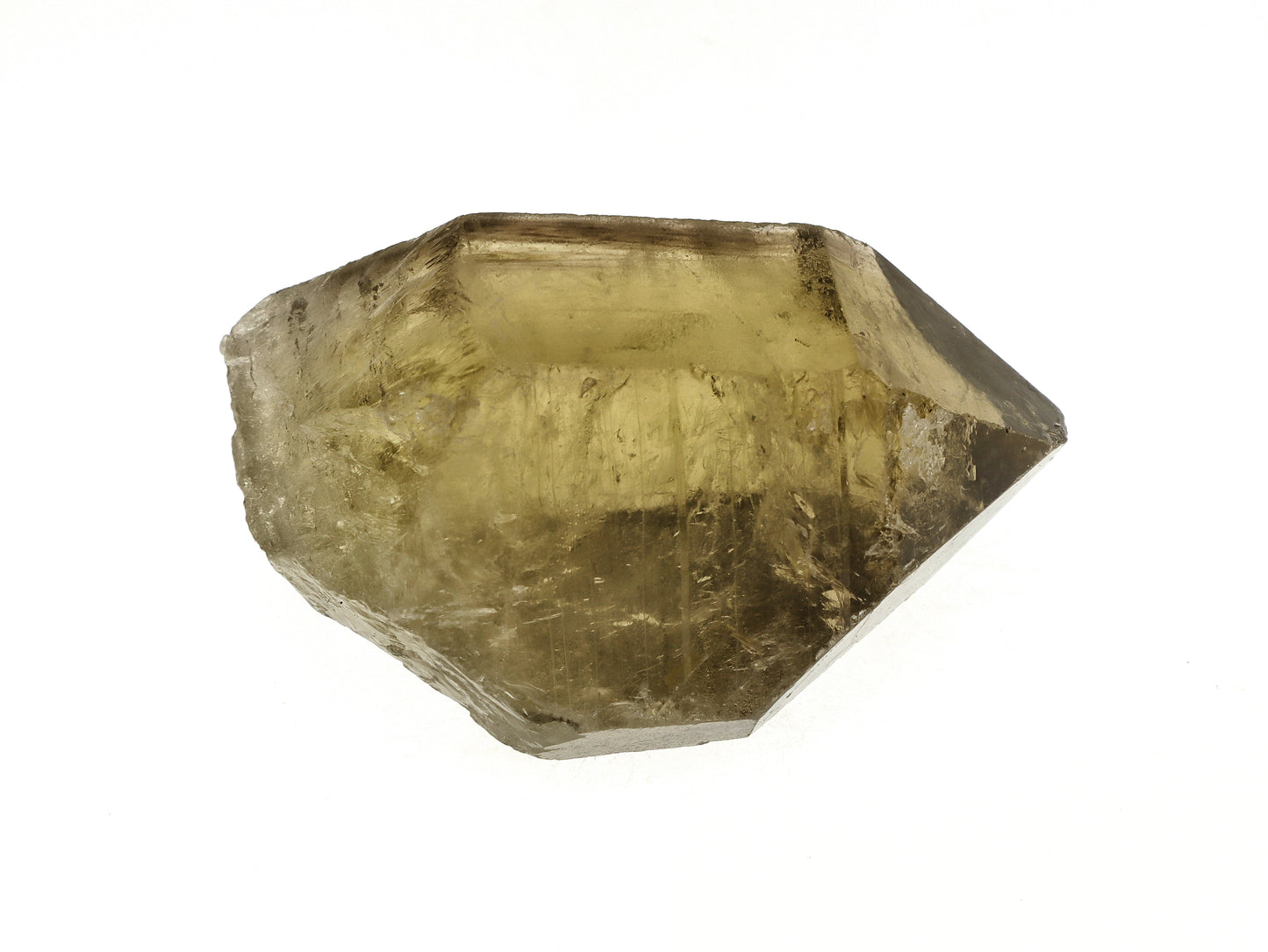Side view of raw citrine quartz crystal with m faces visible