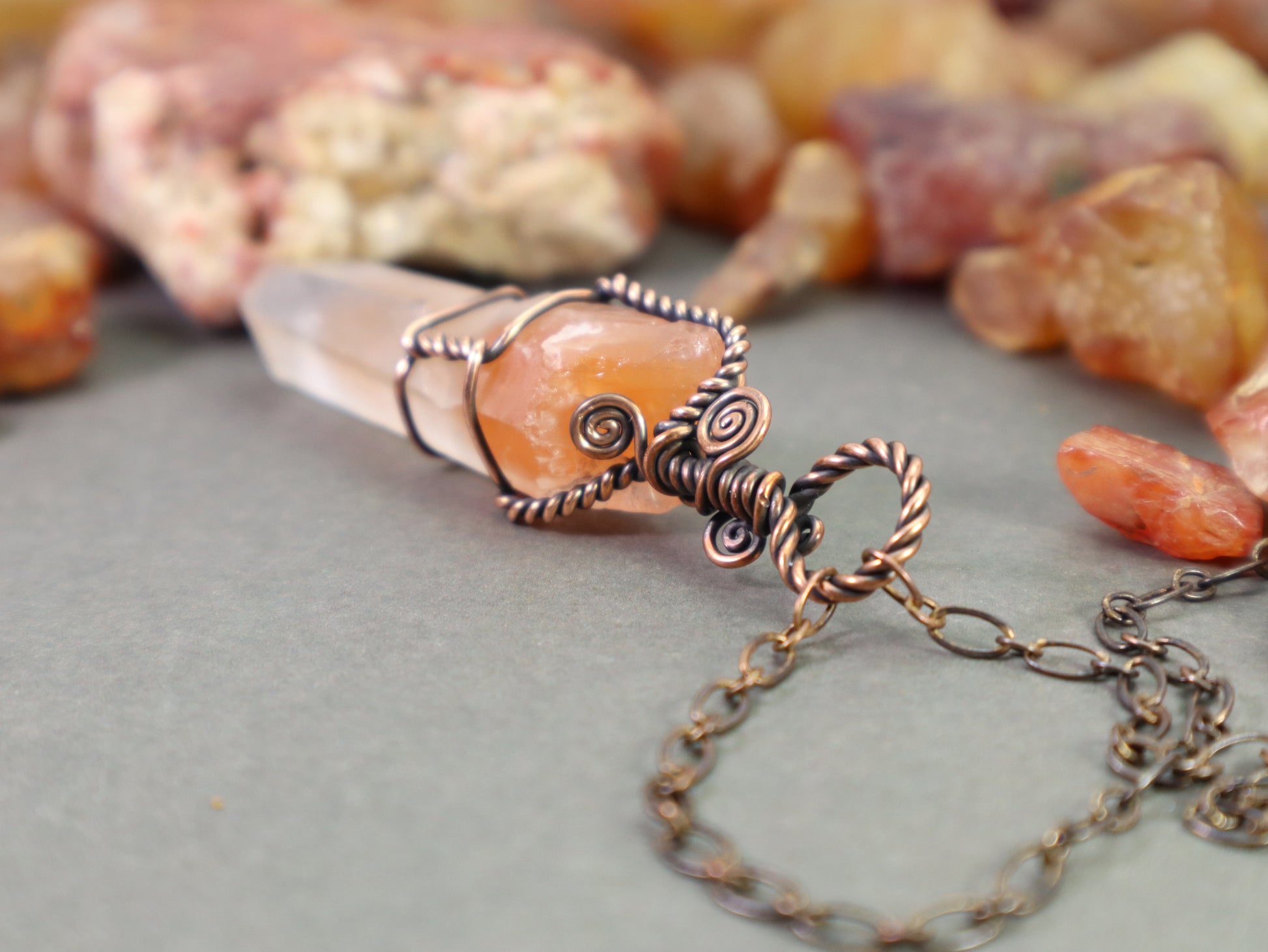 Raw red phantom quartz point pendant with antiqued copper chain