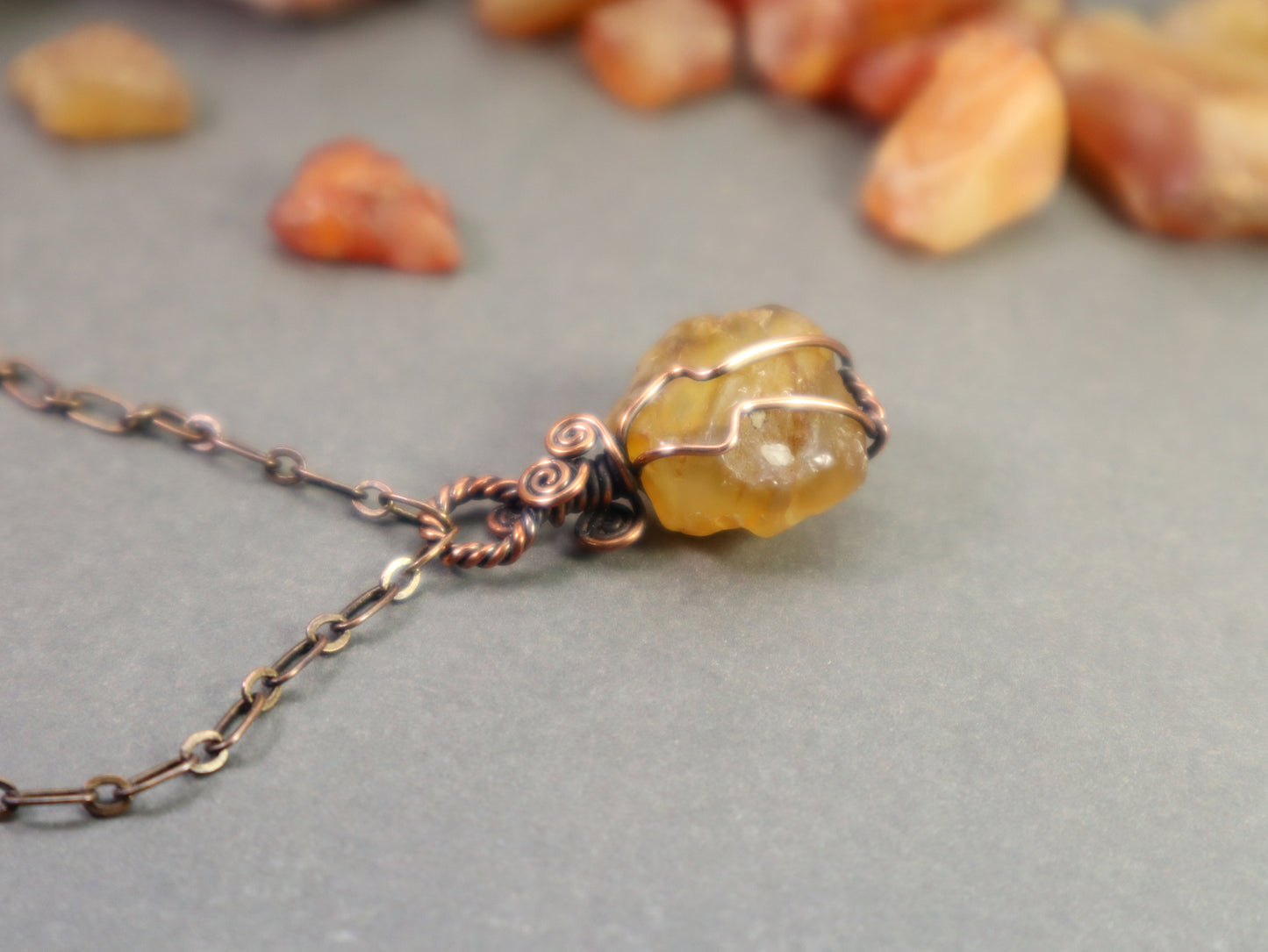 OOAK raw carnelian crystal necklace handcrafted in copper wire-wrapped setting.