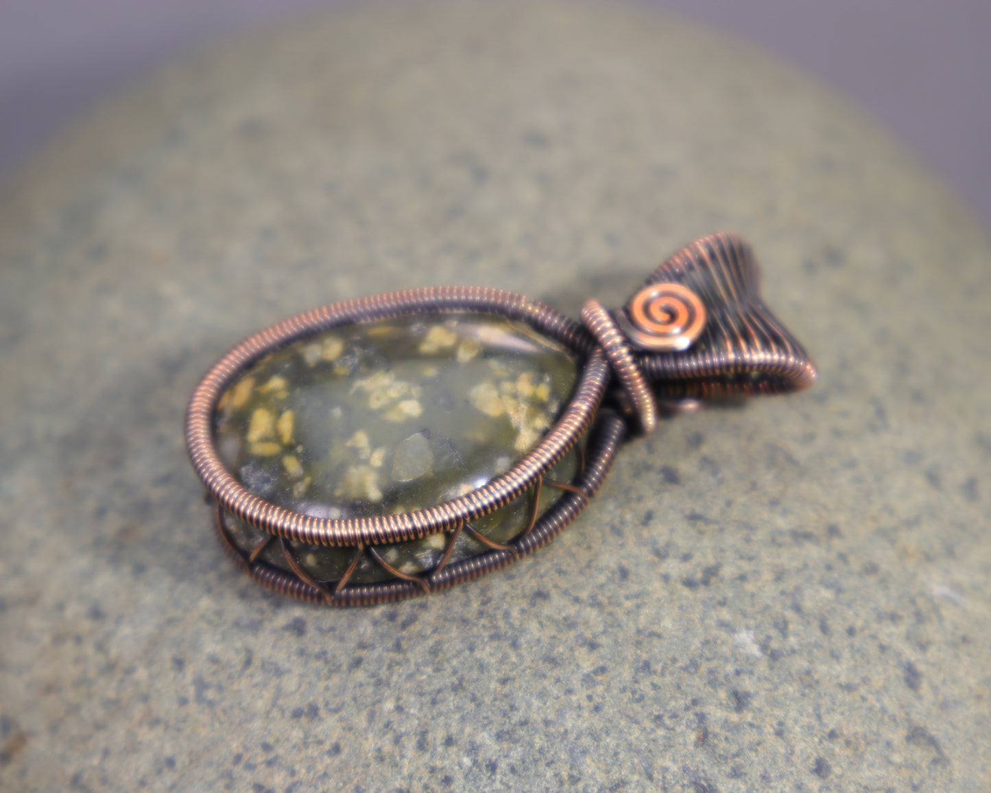 Handmade green jasper gemstone pendant with copper wire weaving