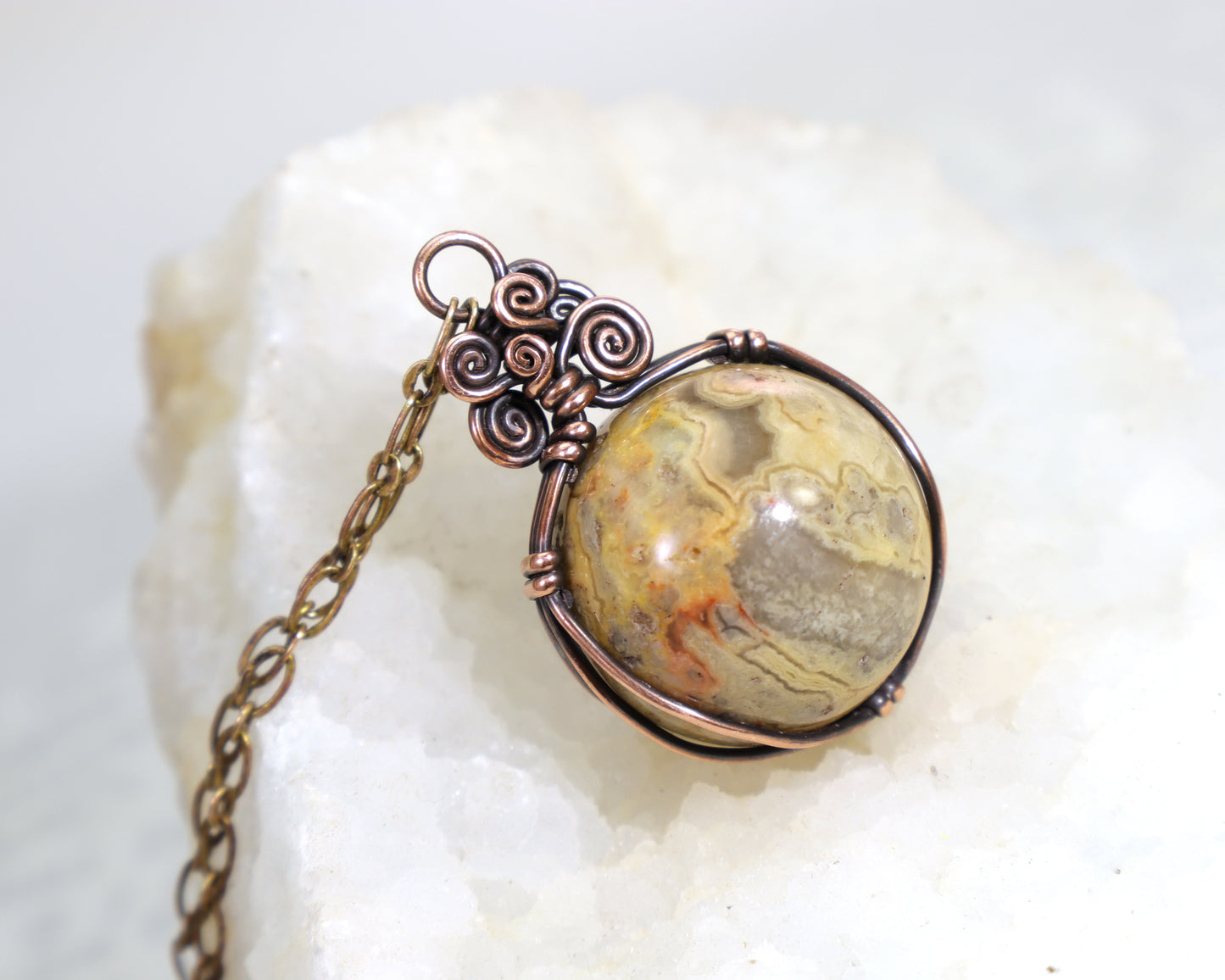 Handmade crazy lace agate crystal ball pendant on copper chain