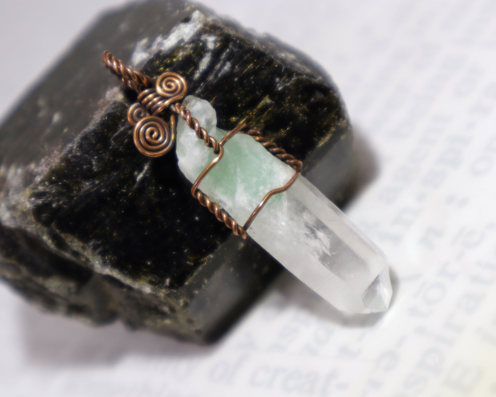 Natural green muscovite phantom quartz crystal pendant on a black tourmaline crystal