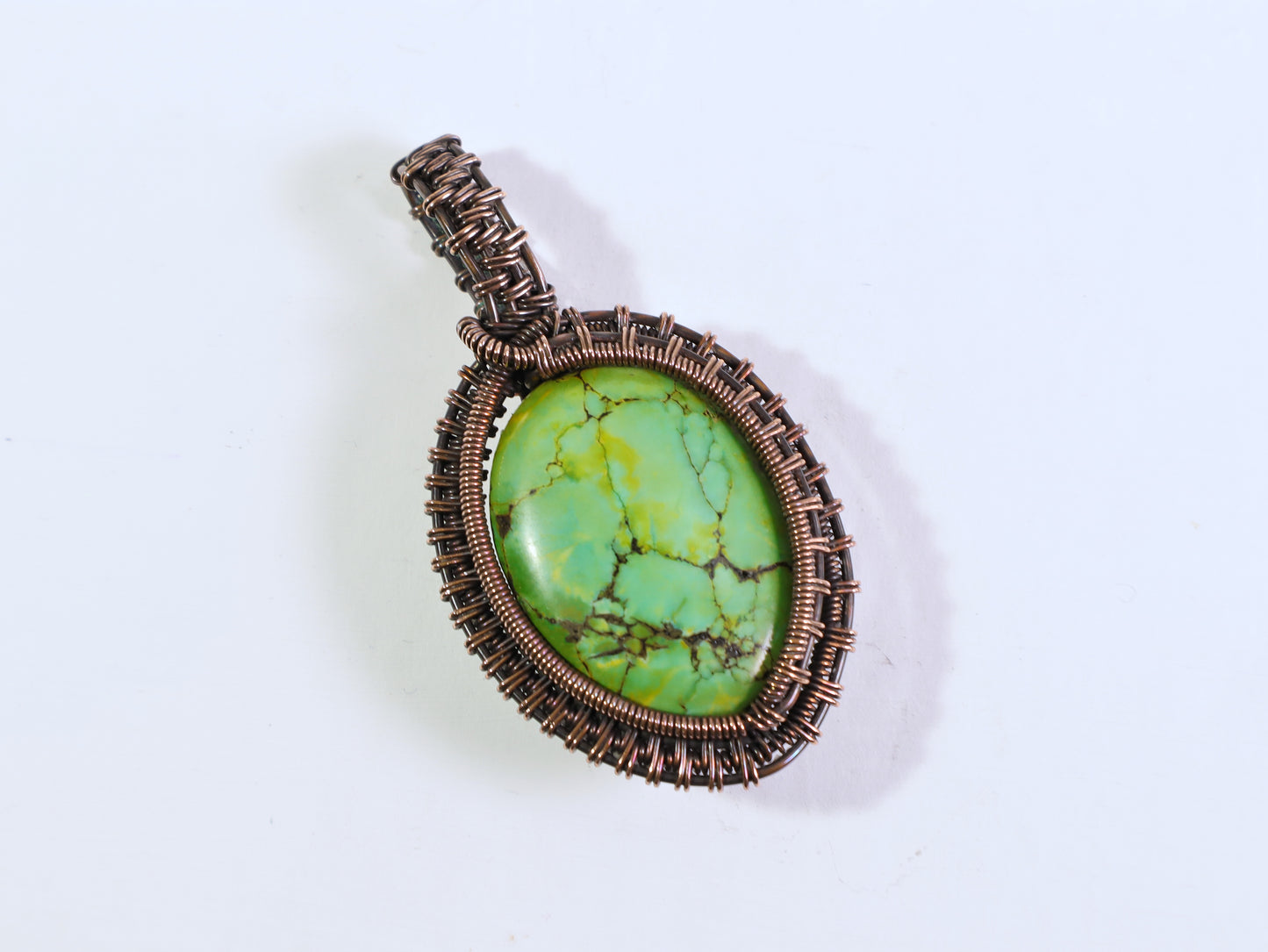 Artisan handcrafted sea sediment jasper pendant in oxidized copper