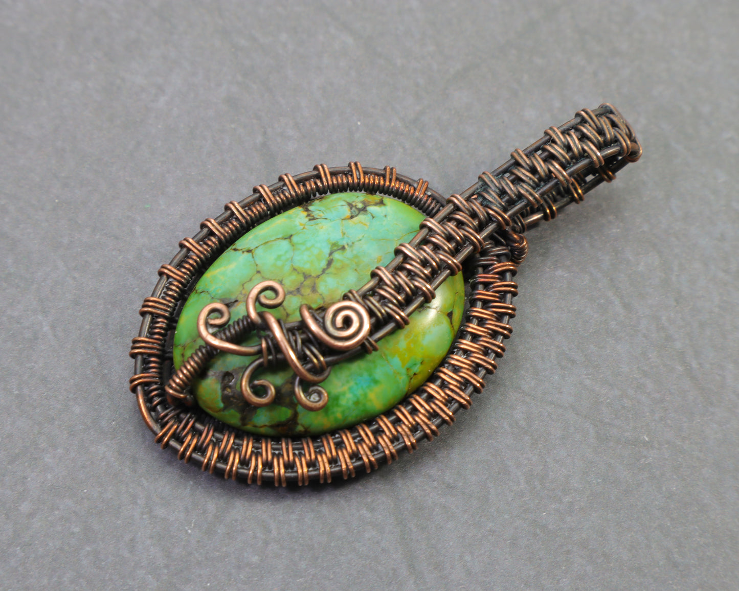 Sea sediment jasper gemstone pendant wrapped in pure copper