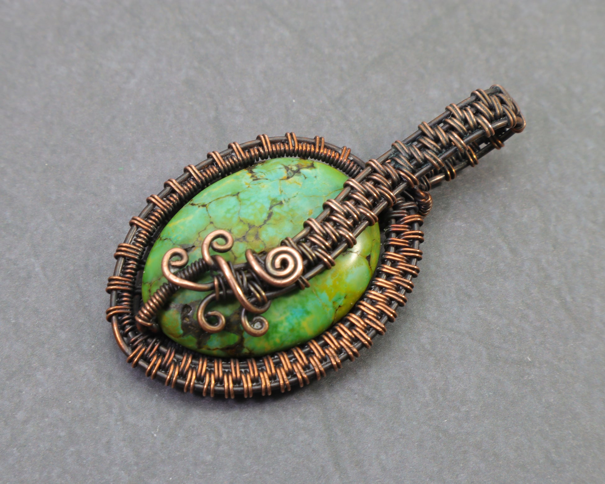 Sea sediment jasper gemstone pendant wrapped in pure copper