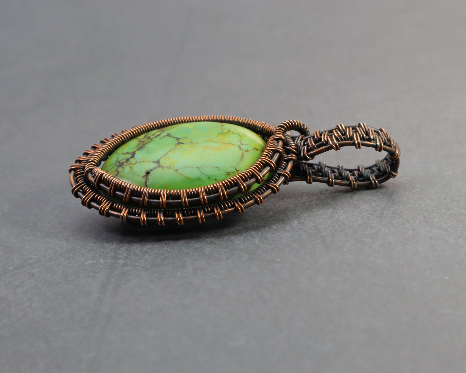 Bright green jasper necklace pendant with natural matrix pattern