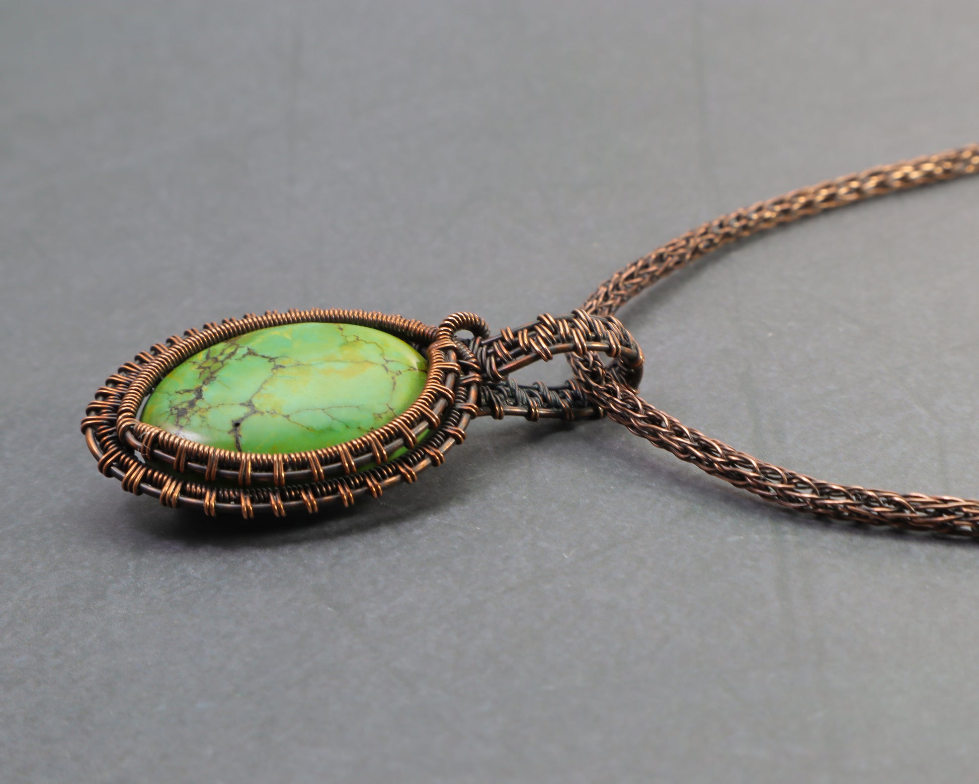 Rustic copper pendant featuring green sea sediment jasper