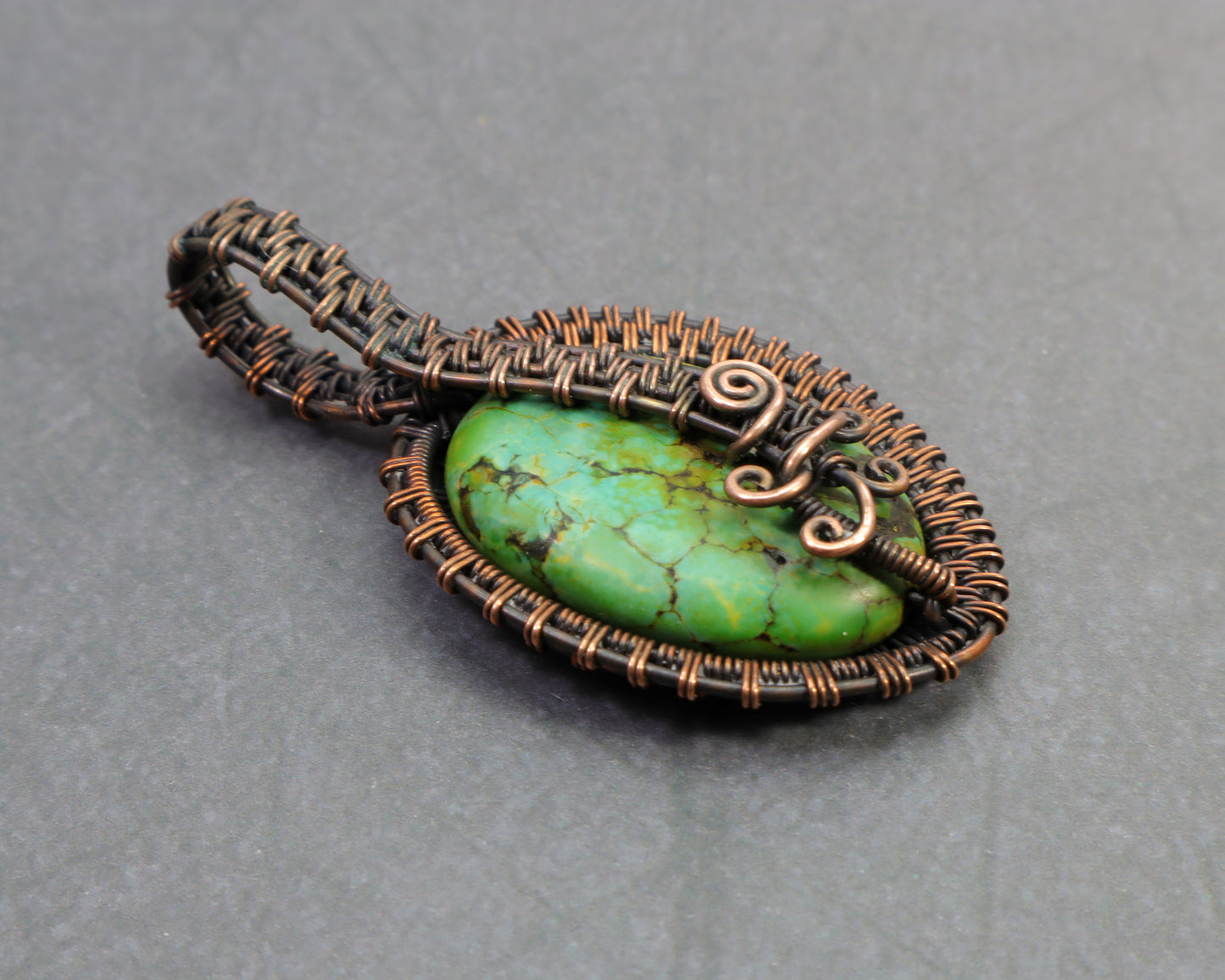 Natural green imperial jasper cabochon in copper wire setting