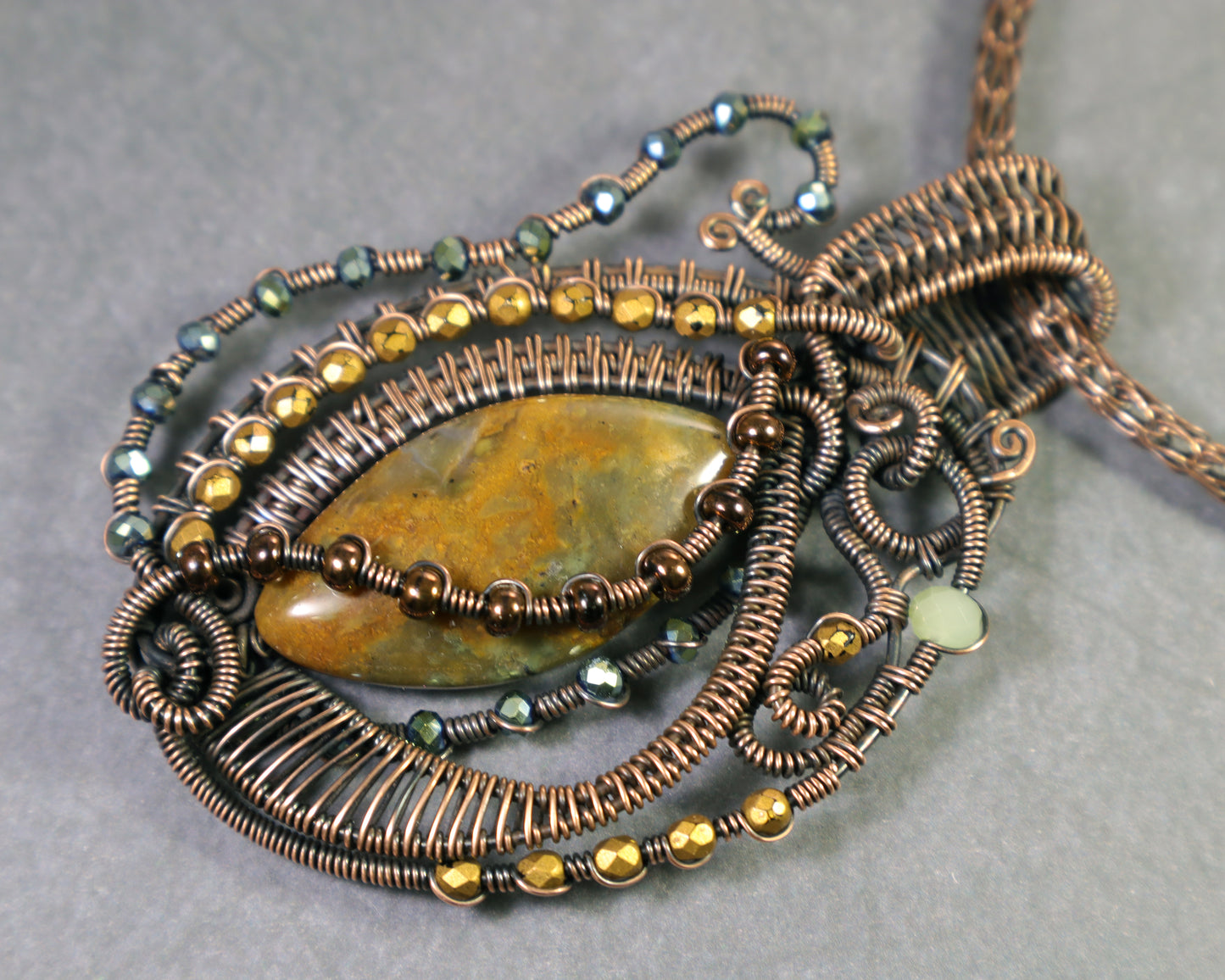 Handmade guitar shaped pendant with moss agate gemstone - Copper wirewrap