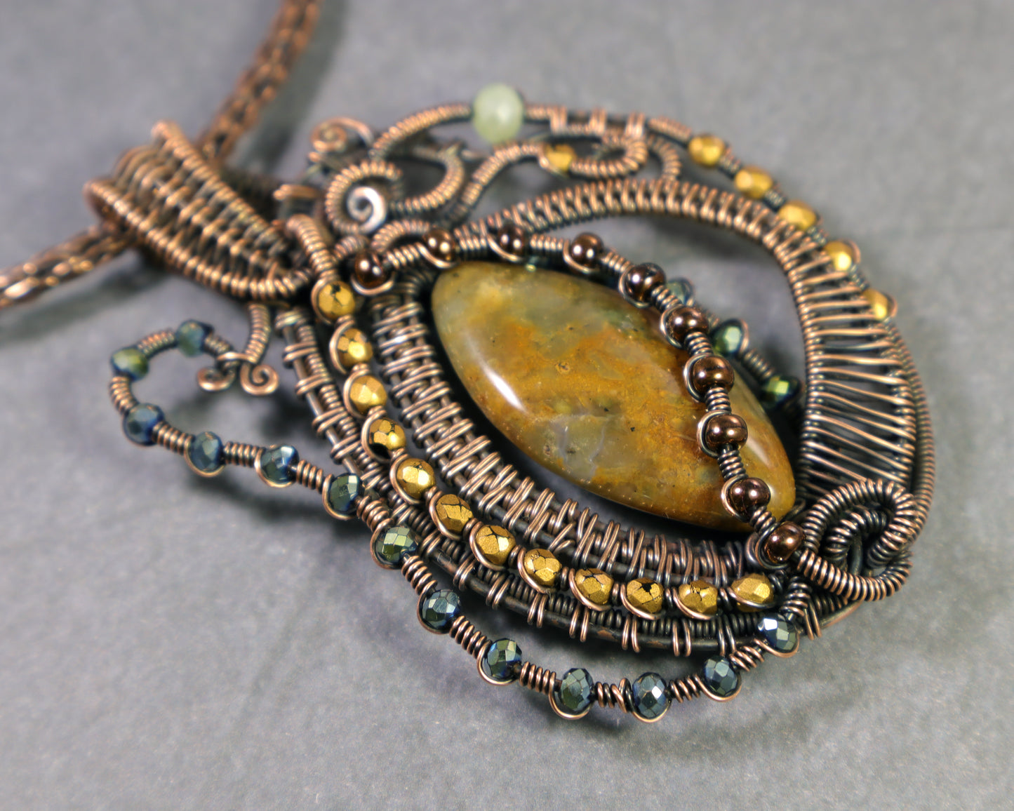 Unique guitar shaped gemstone pendant with crystal embellishments