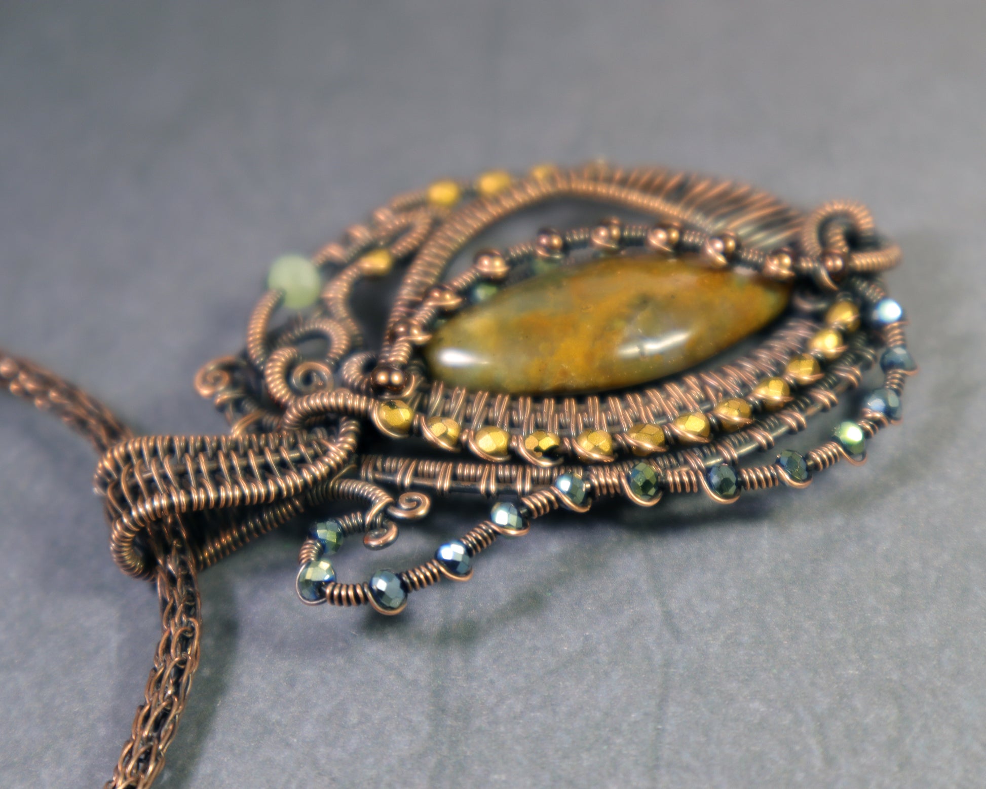 Handcrafted moss agate jewelry with Art Nouveau inspired design