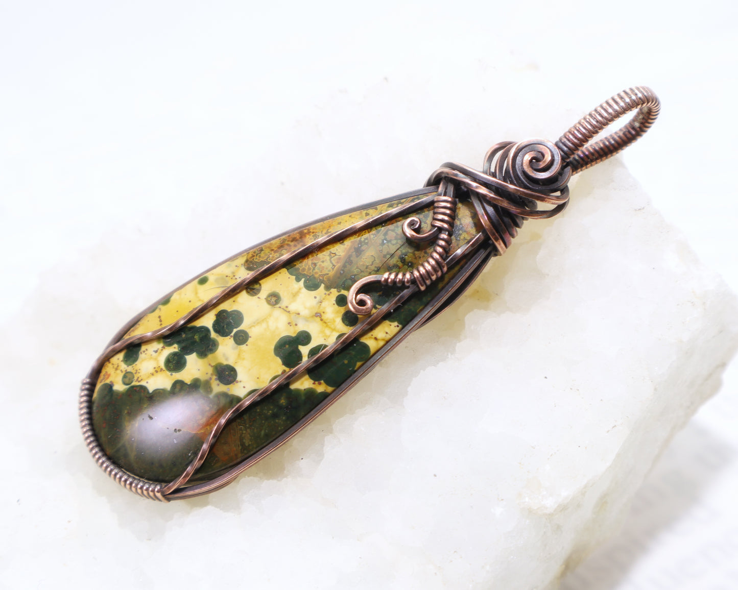 Handmade crystal pendant featuring rare Ocean Jasper from Madagascar