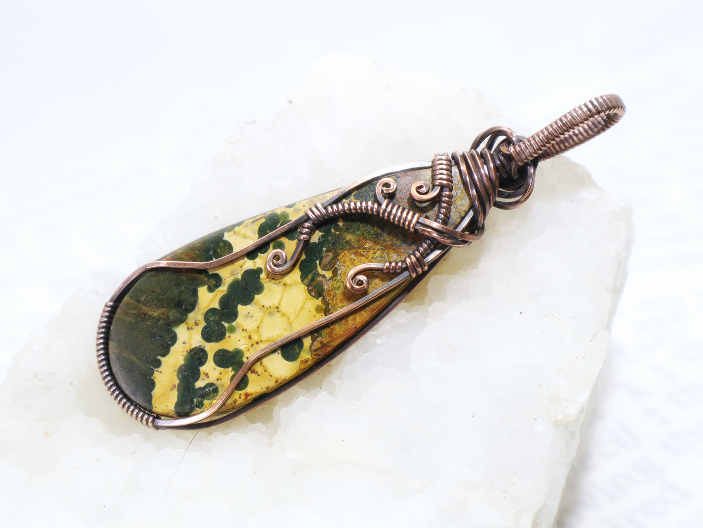 Back side of hypoallergenic Ocean Jasper pendant in nickel free copper