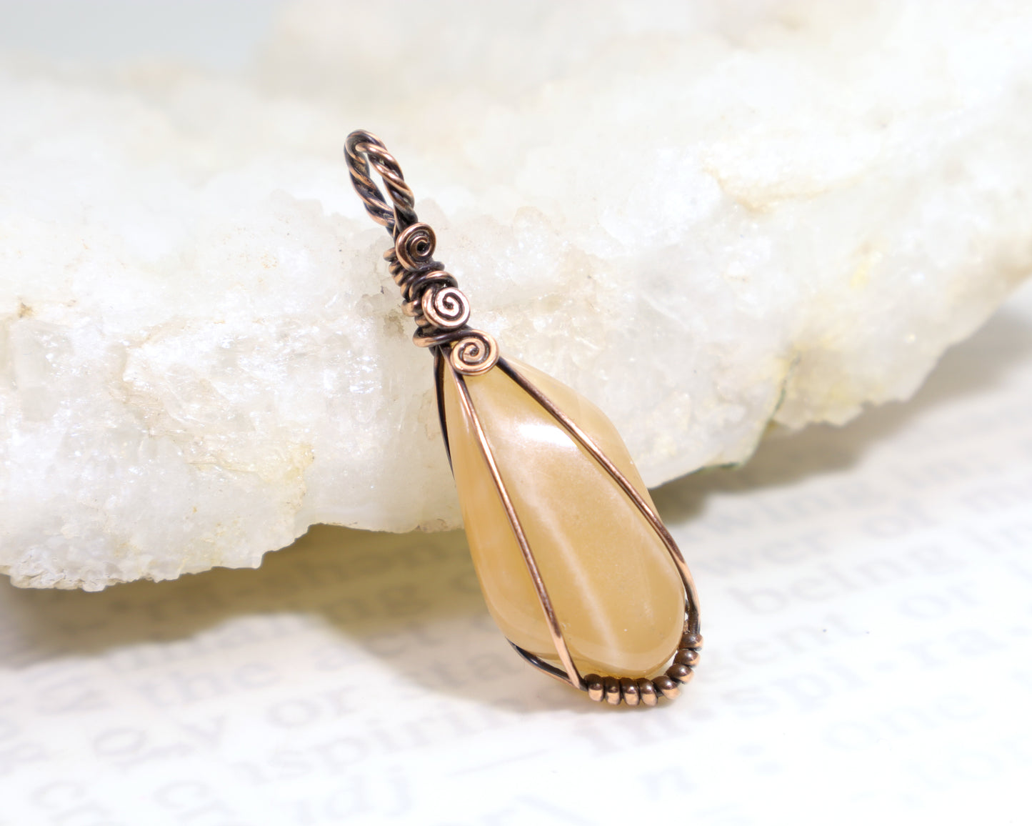 Peach moonstone wire wrapped pendant handcrafted in oxidized copper