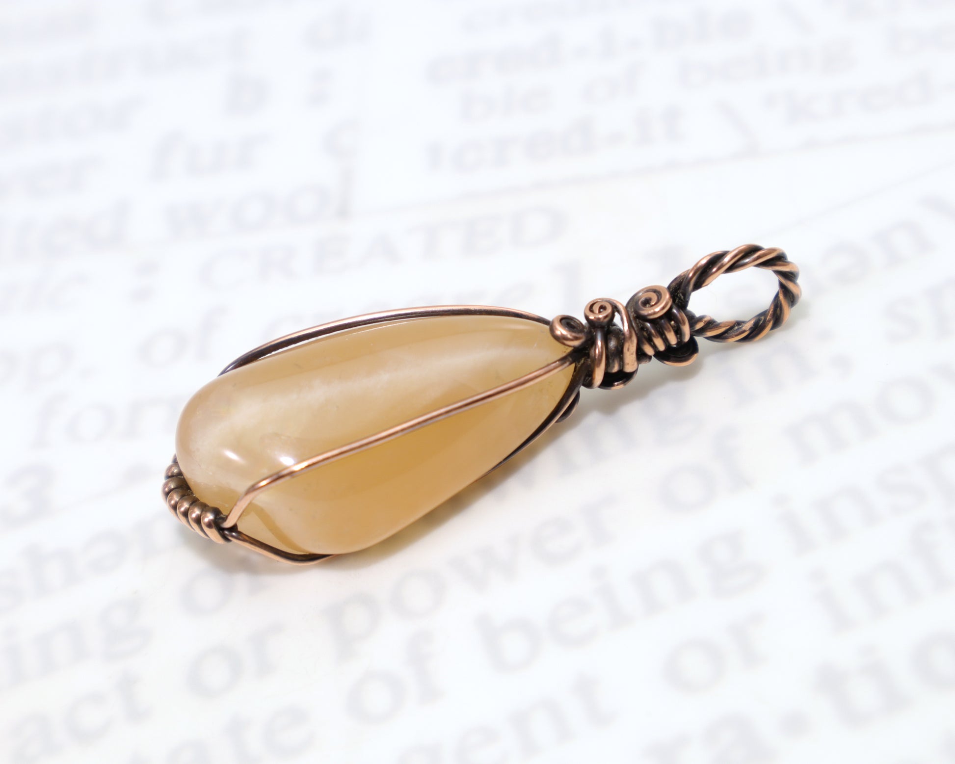 Oxidized copper wire wrapped peach moonstone gemstone jewelry