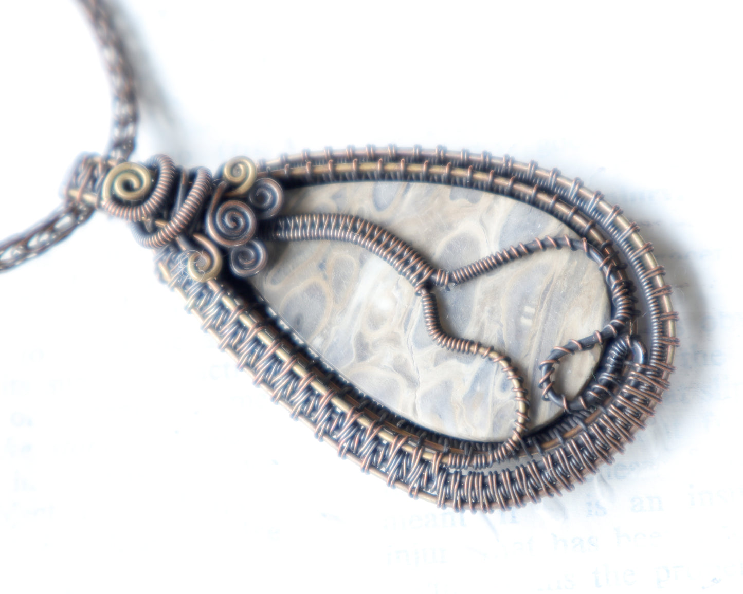 Back View of Fossilized palmwood cabochon pendant with art nouveau wirework