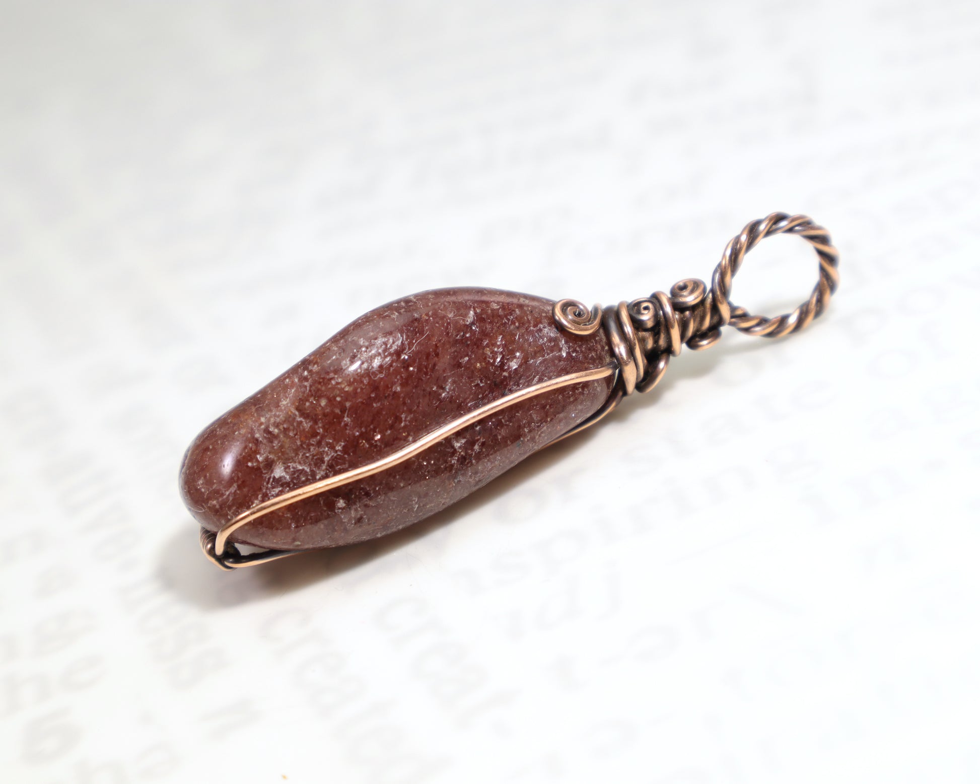 Red aventurine healing crystal pendant with decorative copper wire work