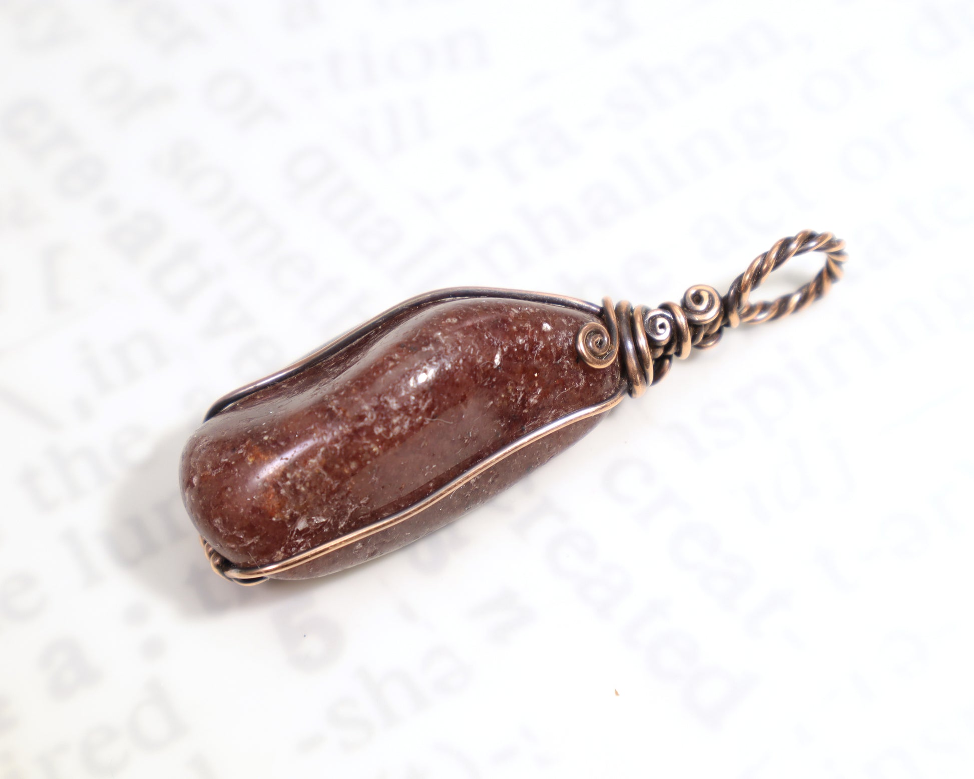 Handmade red aventurine crystal pendant wrapped in pure copper wire