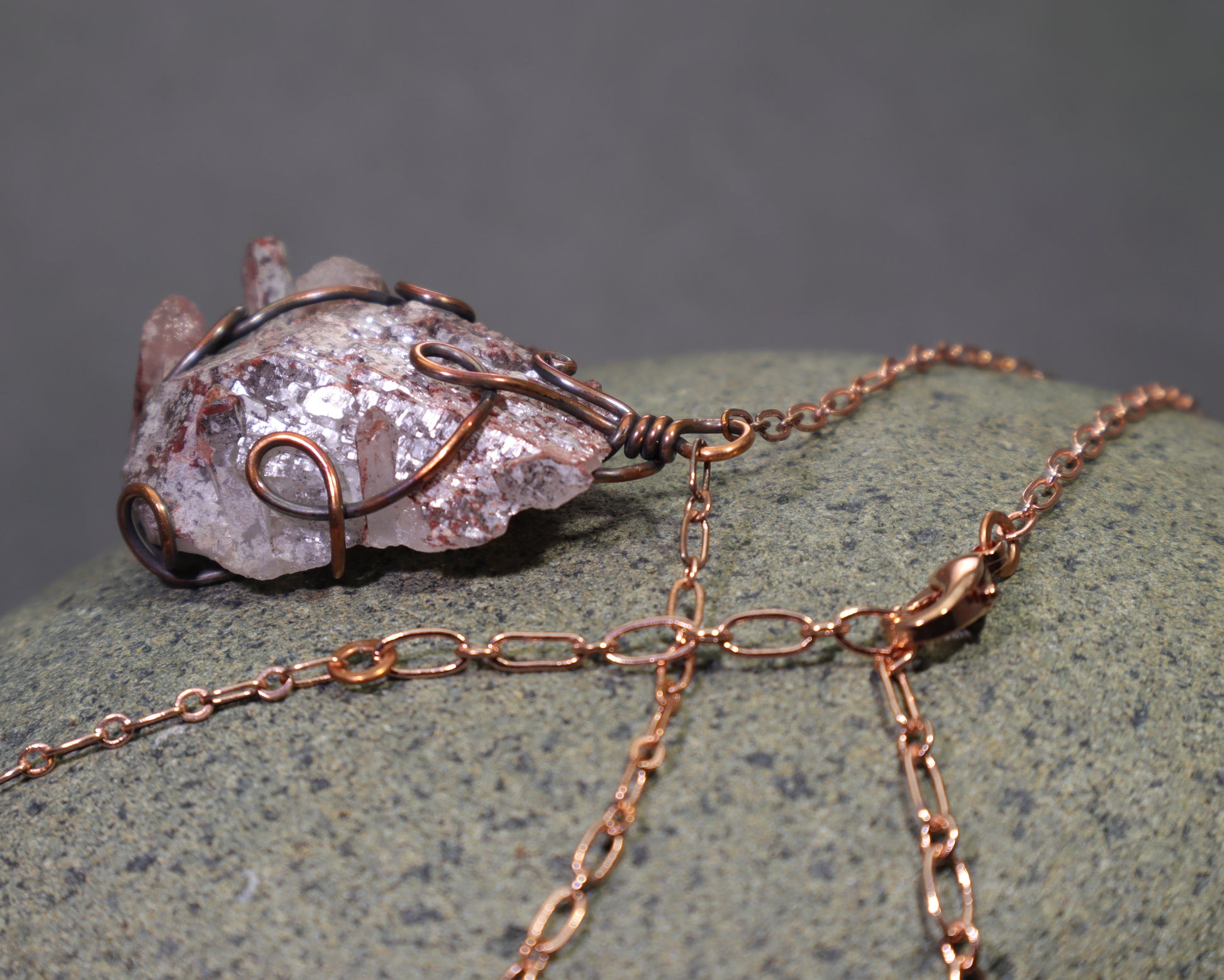 Raw crystal cluster necklace with visible phantom quartz formations on an adjutable copper chain with a lobster clasp and extender chain