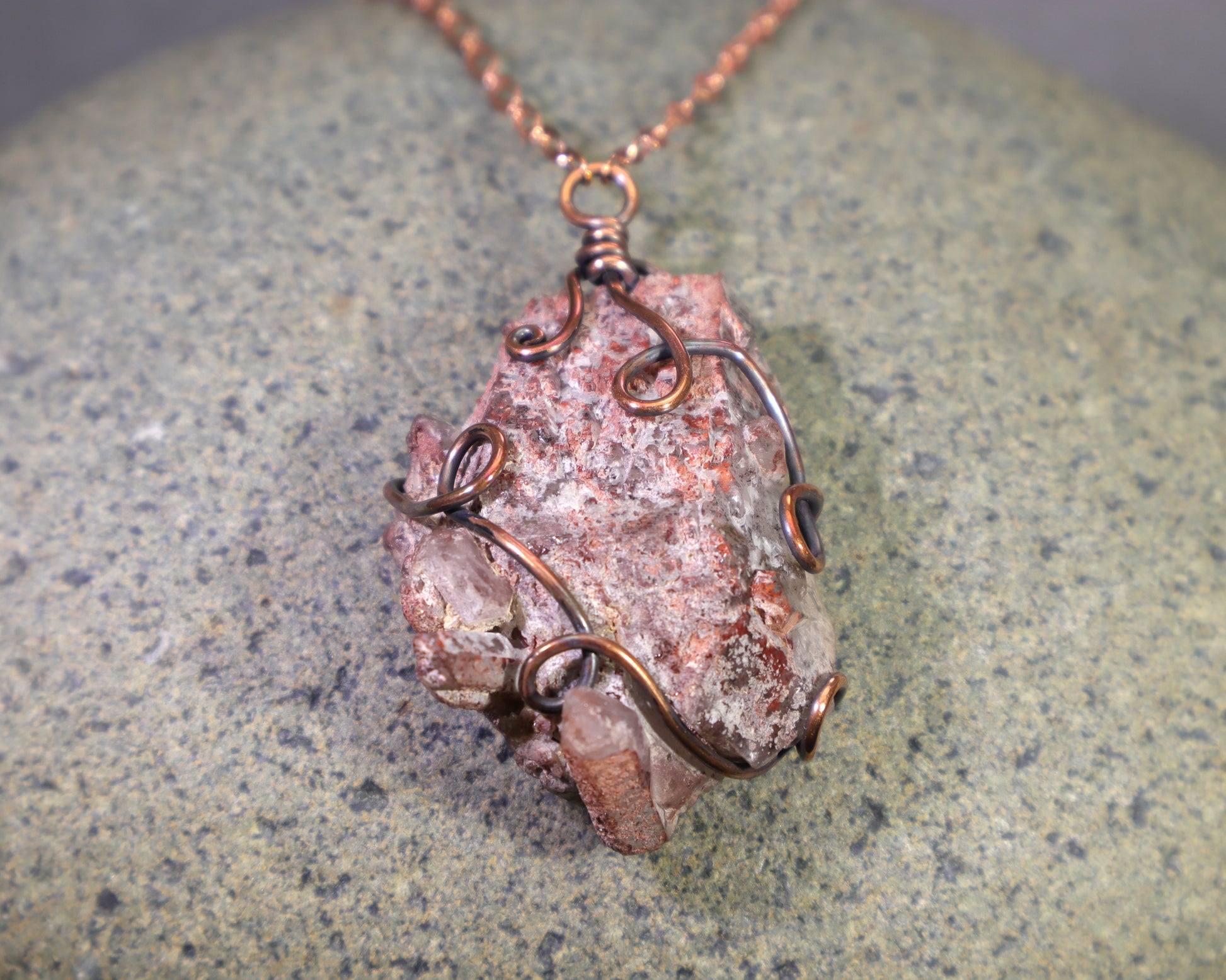 Colombian phantom quartz cluster pendant with rustic copper wirework