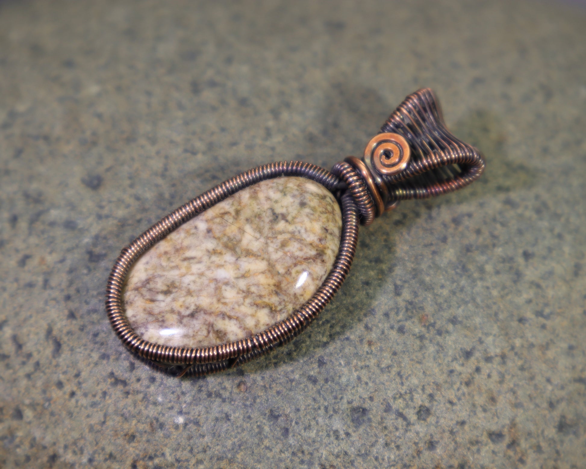 Handmade jasper gemstone pendant with copper wire weave setting