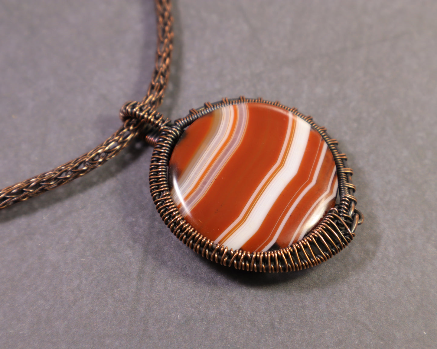 Banded sardonyx agate pendant handmade with pure copper wire
